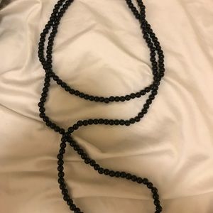 Long black beaded necklace